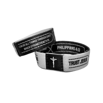 Black and White Christian Daily Bible Verse Wristbands with Philippians 4:13 on it.